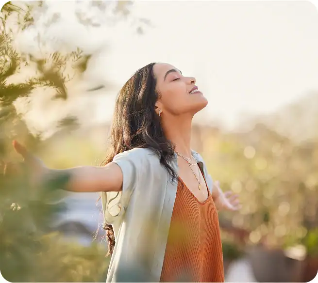 Woman enjoying nature, representing valuable recovery content